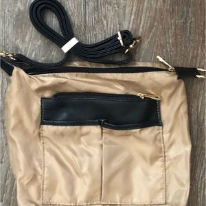 Super lightweight golden Sonja Roberts handbag.